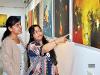 Dr Vinay Dhore gives tips to young artists at a painting workshop in Indore